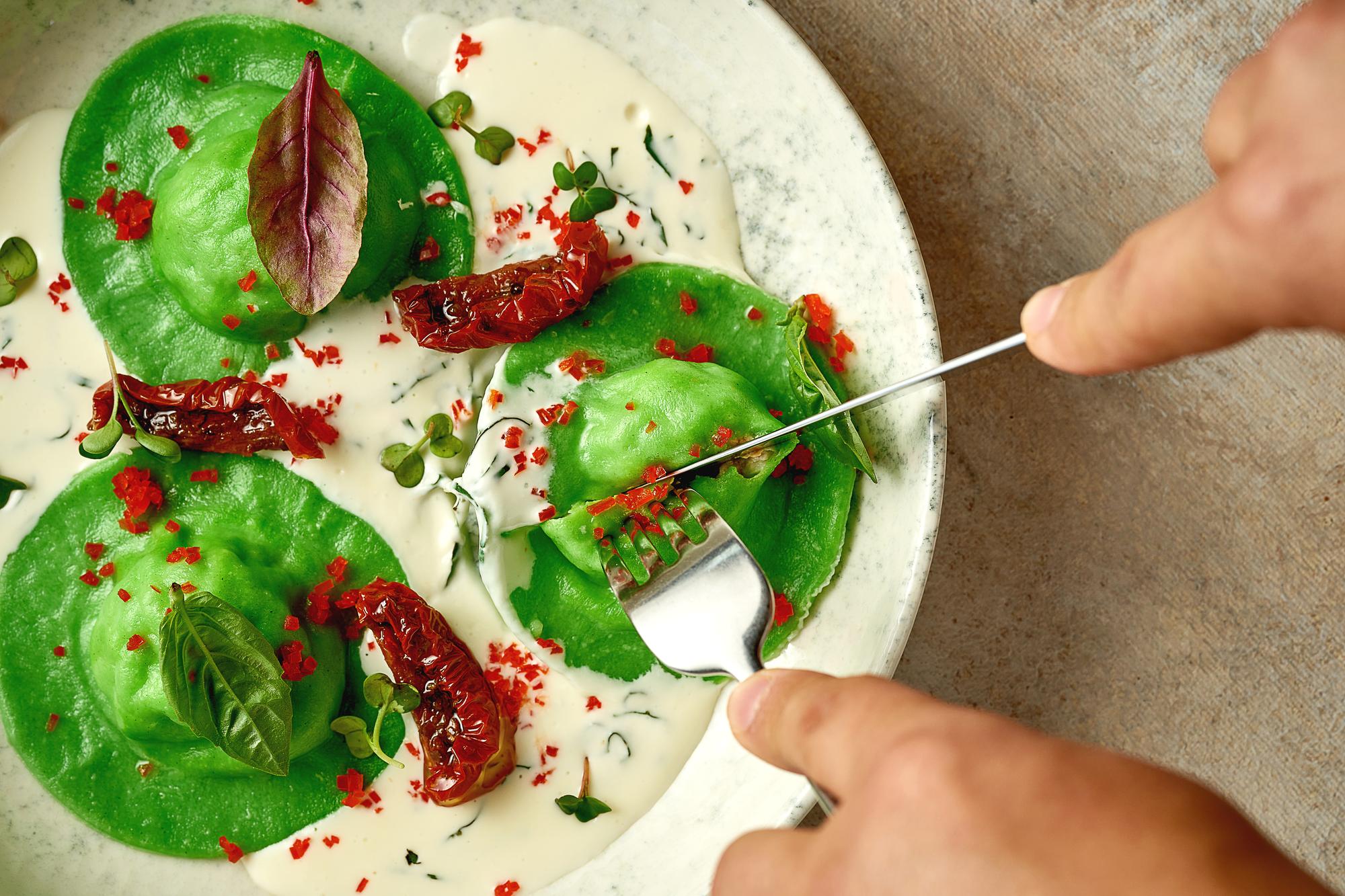 Dessert plated with sauce and herbs